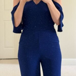 Trina Turk Blue Jumpsuit with V-Neck and Flared Sleeves